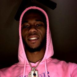 Hip Hop Artist with a Pink Hoodie