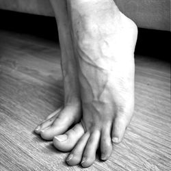 Fleur des Mains' Foot Elevated, Highlighting Detailed Veins and Clean Skin