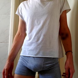 Allthegrapes, a Brazilian model, strips down to underwear