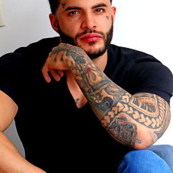 Onlyfans Model with Tattoos and Short Hair