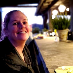 Amy Jordan, Enjoying a Wine at an Outdoor Bar