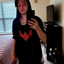 Model in Hoodie Taking Selfie