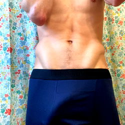 A Model in Socks, Showcasing Abs