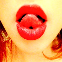 Intimate AbiCocca Photoshoot: Red Lipstick and Playful Gesture