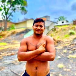 Anthony Torres, a young bodybuilder and fitness enthusiast from Ecuador, standing confidently.