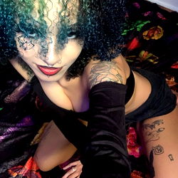 Vivid and Colorful OnlyFans Model with Mermaid Vibes