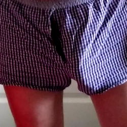 Purple Striped Pajamas in a Playful Model Photoshoot