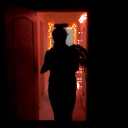 A Silhouette of a Person in Darkness