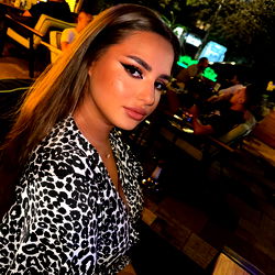 Ana Kush - Stylish Model at Nighttime Social Gathering