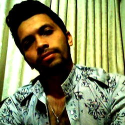 A Man Posing in a Shirt with Patterned Shoulders