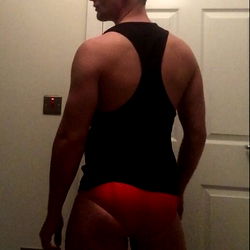 GoBigOrGoHome in a Stylish Backless Swimsuit