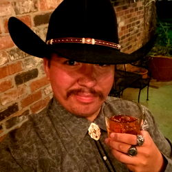 A Man in a Cowboy Hat