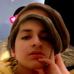 Sebastian Santoyo, A California-Based Model Posing with Hands on Face