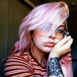 Emotive Pink-Haired Individual
