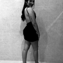 Model Amber8745 Poses in a Black Dress