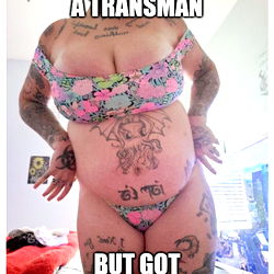 Thick, Tatted, Androgynous photo