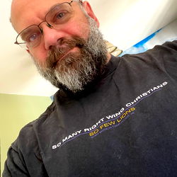 Man in a Room Taking a Selfie