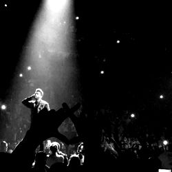 Early Mac on stage at a concert