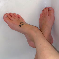 Gianna Malone's Toes in a Bathroom