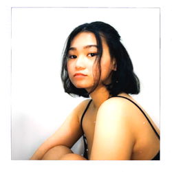 Nicky, a young and stylish model with an edgy vibe.