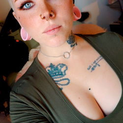 Adrestia Knight, a model with tattoos and piercings