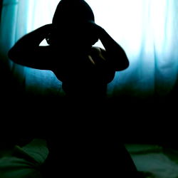 Silhouette of a Model in a Room