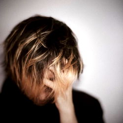 Indistinct Musician in Contemplative Pose