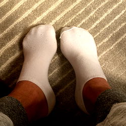 Aaron Showcasing Socks for Sale