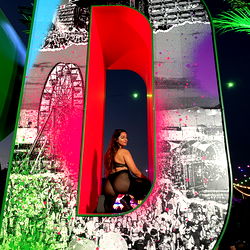 Ash, a stunning model with a vibrant fashion sense, is showcasing her latest collection at an event. She is standing confidently on the runway, turning heads with her captivating look.