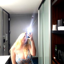 Beautiful OnlyFans Model in Bathing Suit Taking Selfie