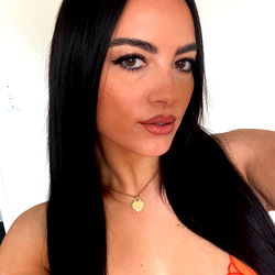 Australian Model Rose Davis in a Stunning Orange Swimsuit