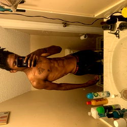 Ace Murdaa in bathroom mirror