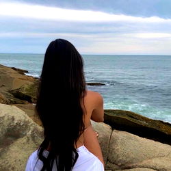 Candid Moment on a Coastal Cliff