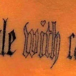 Tattoo Artist's Skilled Hand